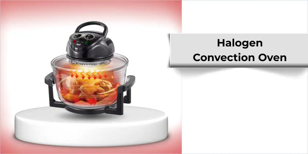 Halogen convection oven with a glass bowl cooking a whole chicken using radiant heat.