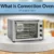 Convection oven on a kitchen counter with a visible internal fan, showing what a convection oven is.